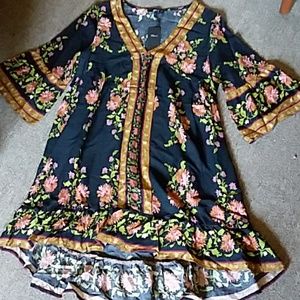 Loose fitting and flowing dress.